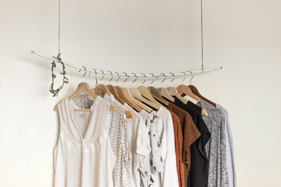 Minimal capsule wardrobe clothing rack with muted tones